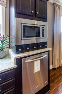 Del Webb has lowered the microwave and raised the dishwasher for greater convenience.