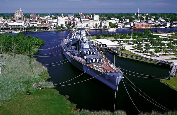 The USS North Carolina was one of the most decorated battleships of World War II. Moored across the Cape Fear River from Wilmington, it's now one of the state's most popular historic sites.