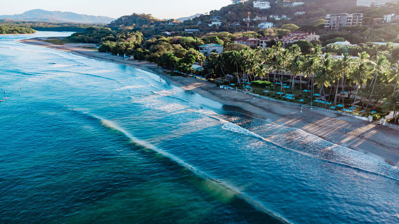 Drone shot of sunrise on Tamarindo Beach, Costa Rica